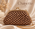 Chainette bronze metallic leather crochet clutch with gold strap